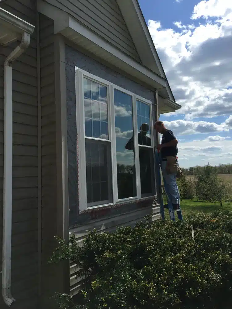 Workers make windows for home
