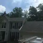 Dark white house with garage