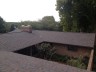 View from the roof to the garden roofing window slider