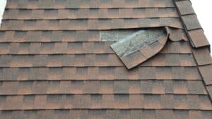 Torn Shingle on Mansard - Closeup Shot